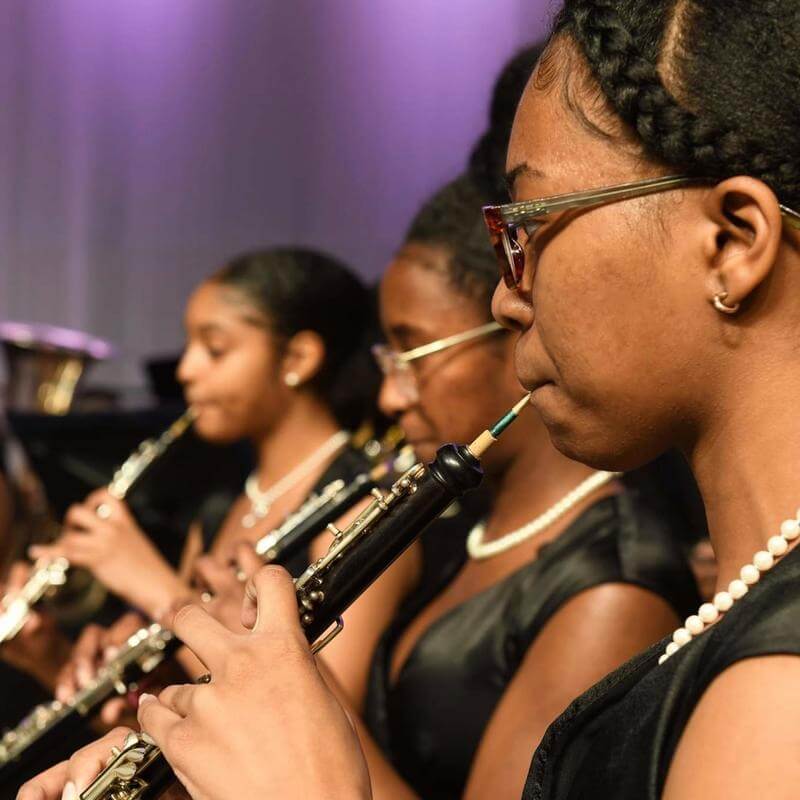 A performance by wind instrument musicians from the Department of Music.