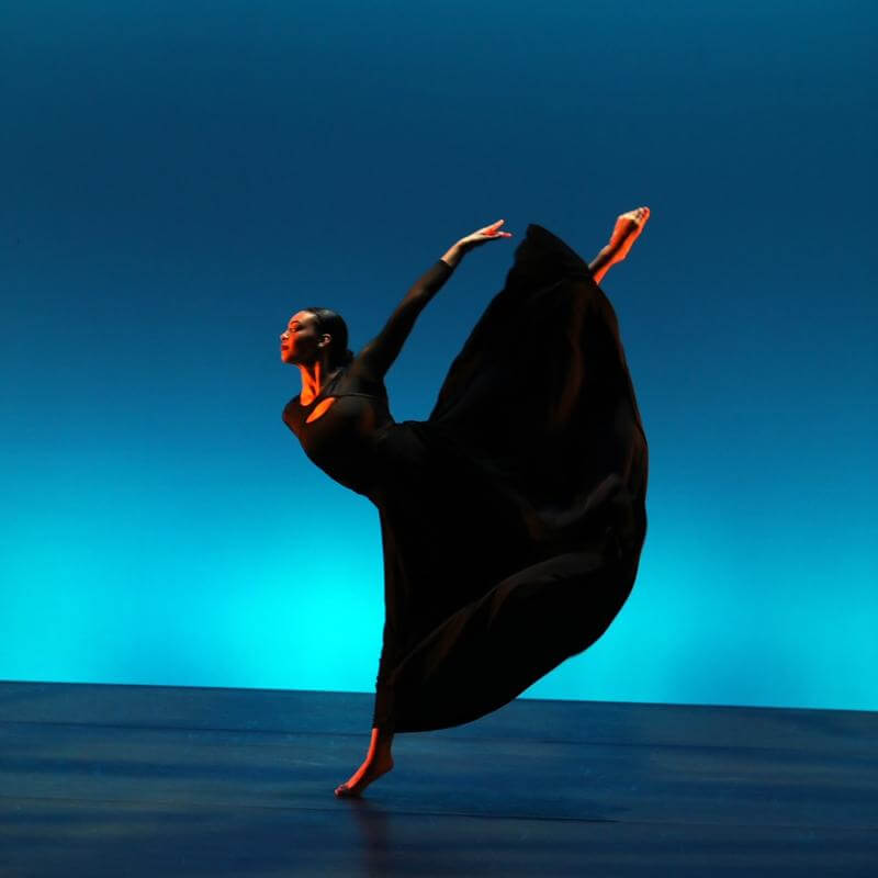 A dancer performing onstage.