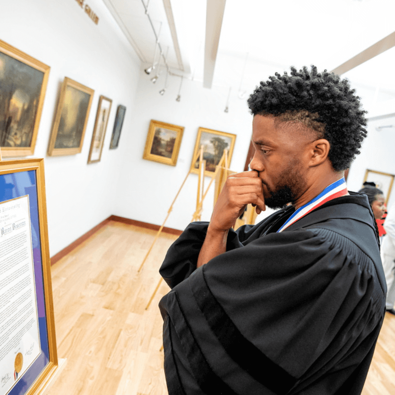 Chadwick Boseman at Howard University's art gallery.