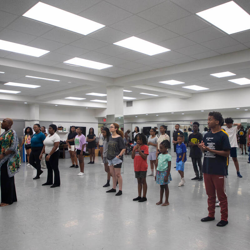 students in a dance class in a dance studio