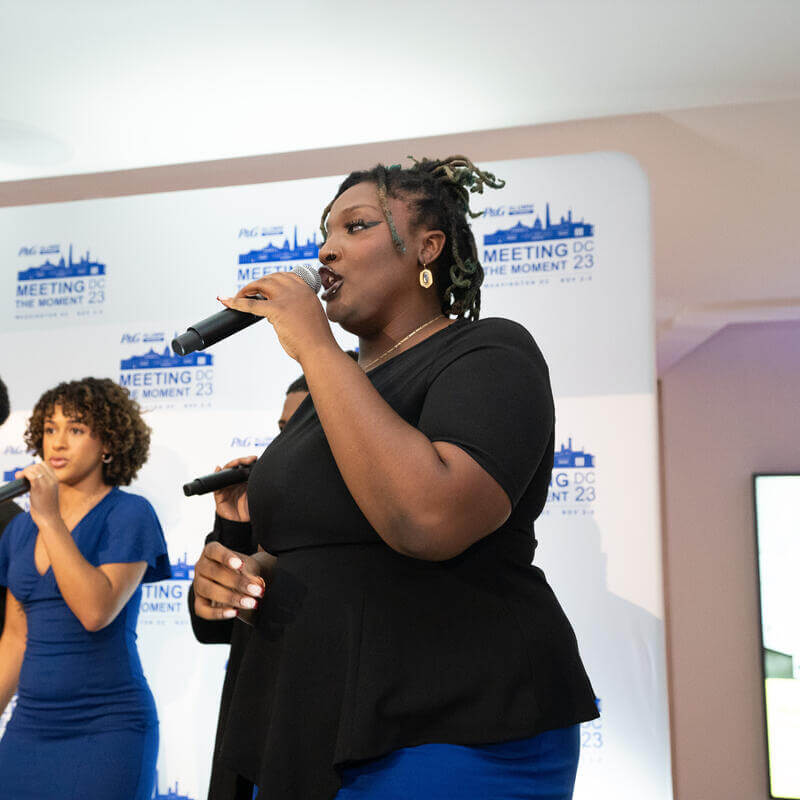 Group of students sing