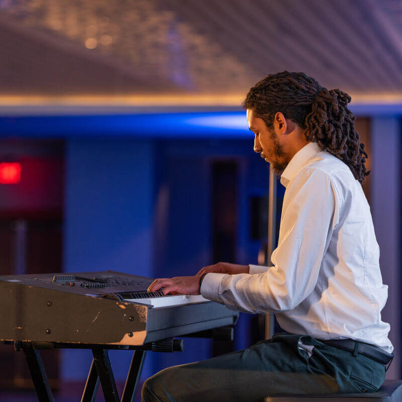 Student plays piano