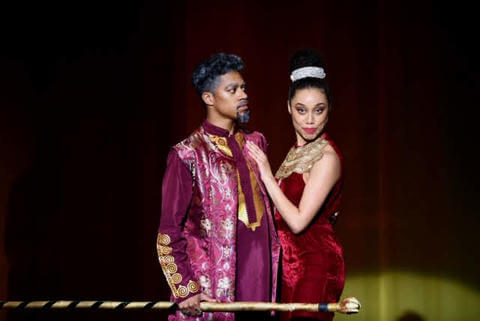 Performers playing Fastrada and Charlemagne on stage in Howard University's production of the musical Pippin.