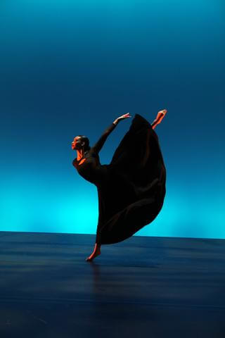 A dancer performing onstage.