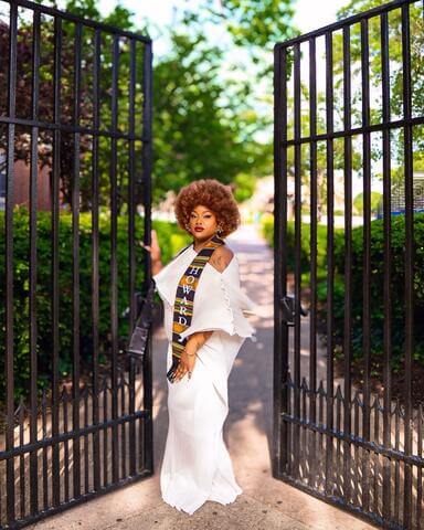 Lamiya Murray in white dress with Howard University stole