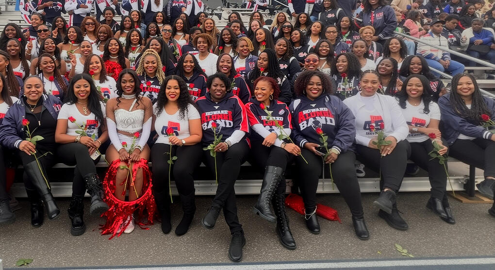 Sisterhood off the field: A candid moment of alumnae and current members connecting behind the scenes.