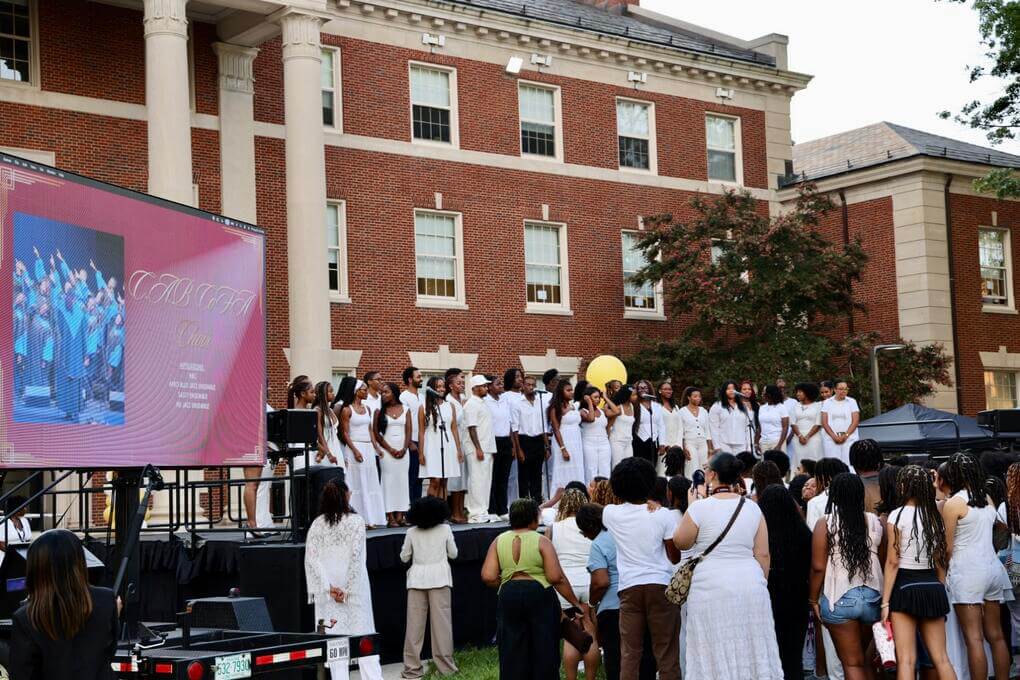 The CABCoFA Choir opens the Chadwick A. Boseman Day Student Showcase with a performance on the Yard in front of Douglass Hall.